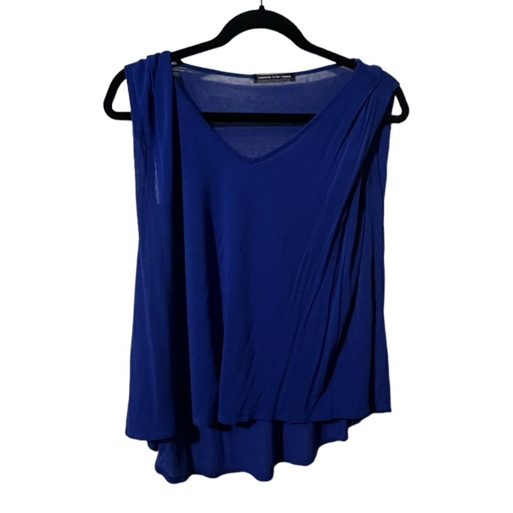 New blue sleeveless high low top